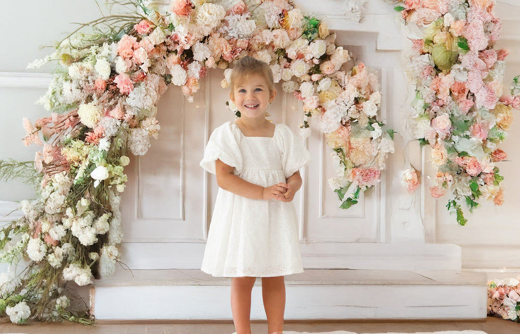 Girl Wearing A White Eyelet Easter Dress